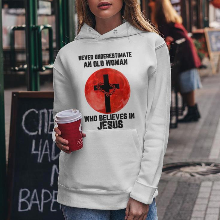 Never Underestimate An Old Woman Who Believes In Jesus Old Woman Funny Gifts Women Hoodie Unique Gifts