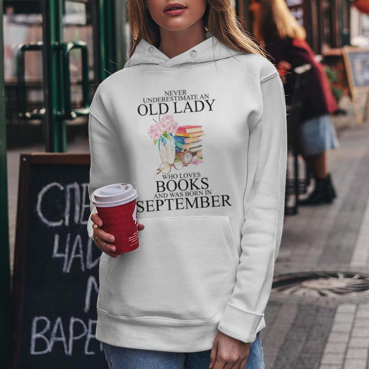 Never Underestimate An Old Lady Who Loves Books September Women Hoodie Unique Gifts