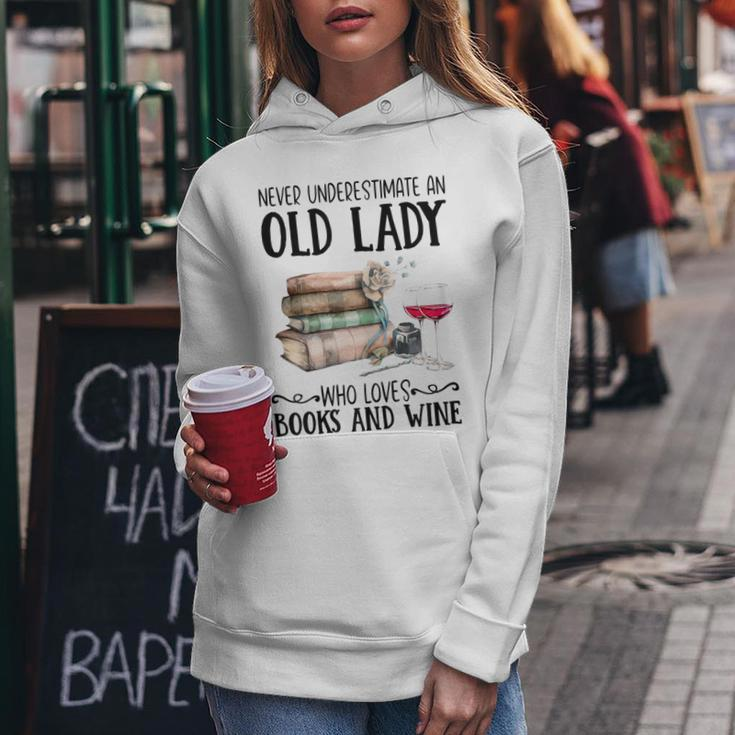 Never Underestimate An Old Lady Who Loves Books And Wine Women Hoodie Unique Gifts