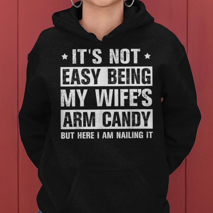 Its Not Easy Being My Wifes Arm Candy Here I Am Nailing It Women Hoodie