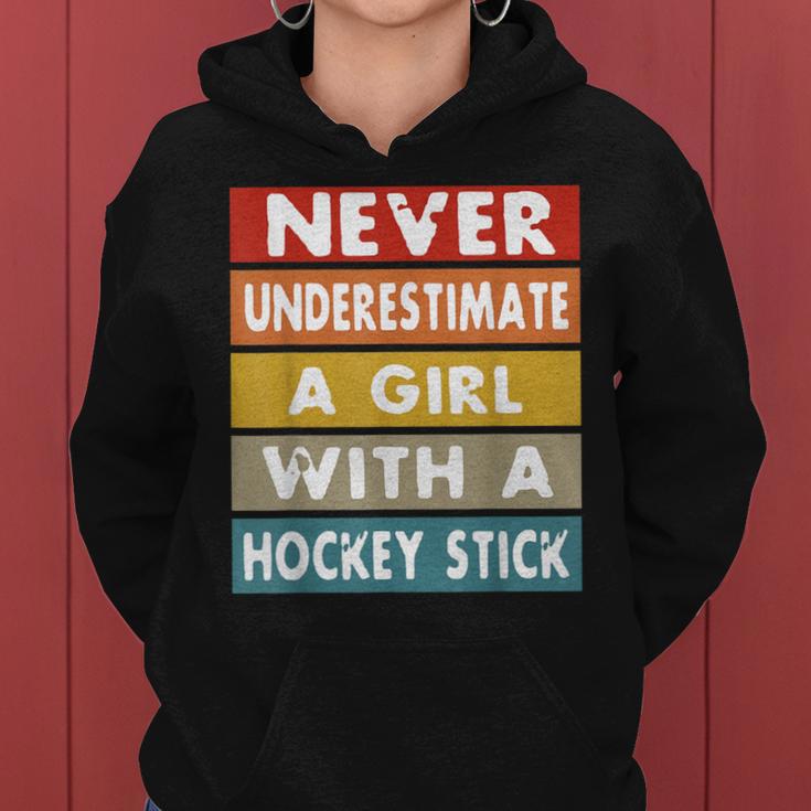 Never Underestimate A Girl With A Hockey Stick Women Hoodie