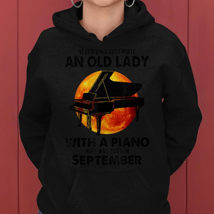 Never Underestimate An Old Lady With A Piano Born September Women Hoodie