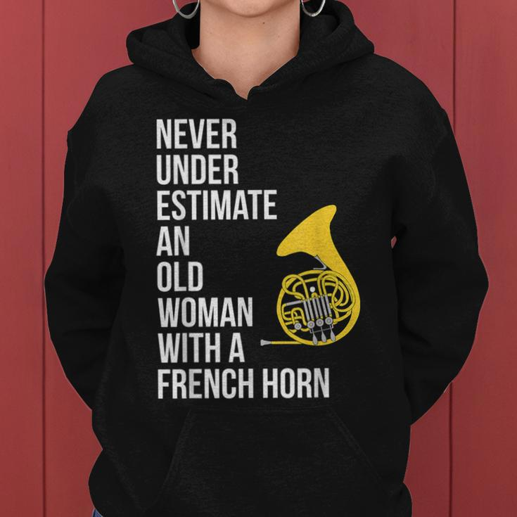 Never Underestimate An Old Woman With A French Horn Women Hoodie