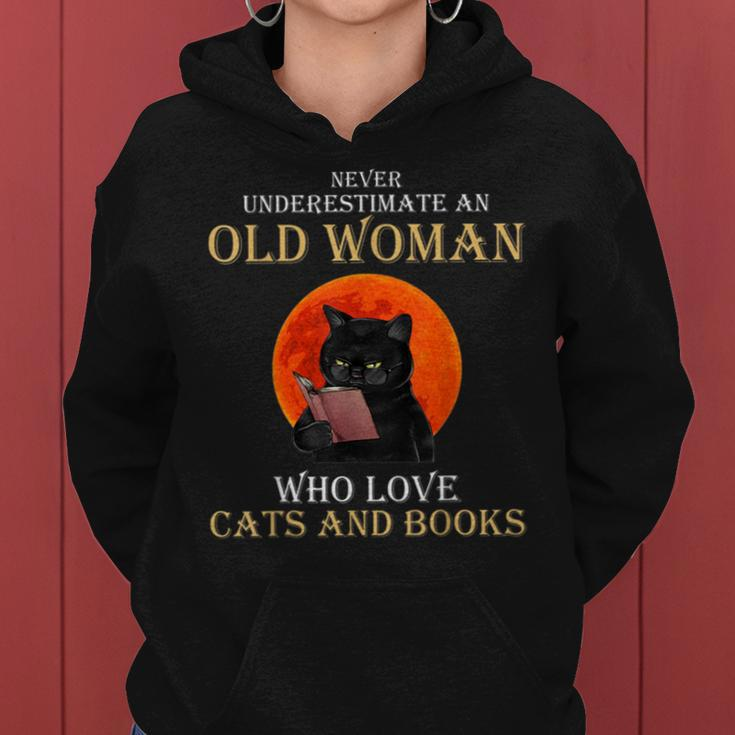 Never Underestimate An Old Woman Who Love Cats And Books Women Hoodie