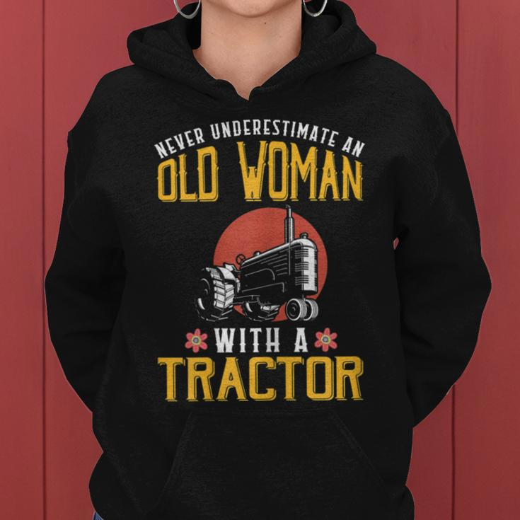 Never Underestimate An Old Woman With A Tractor Women Hoodie