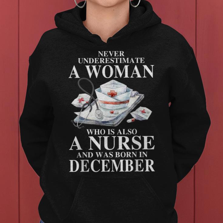 Never Underestimate A Woman Who Is Also A Nurse December Women Hoodie Never Underestimate A Woman Who Is Also A Nurse December Women Hoodie