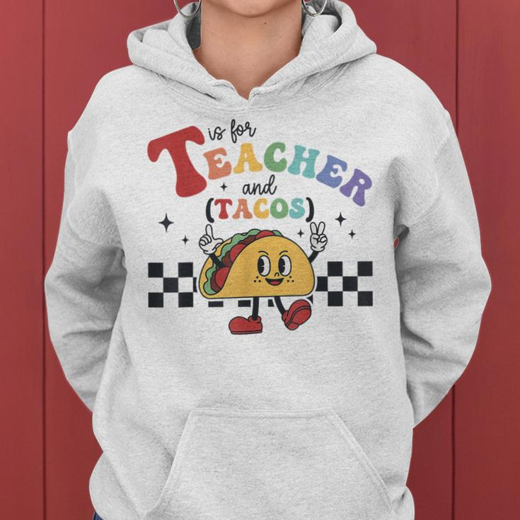 T Is For Teacher And Tacos Funny Back To School Teaching Women Hoodie