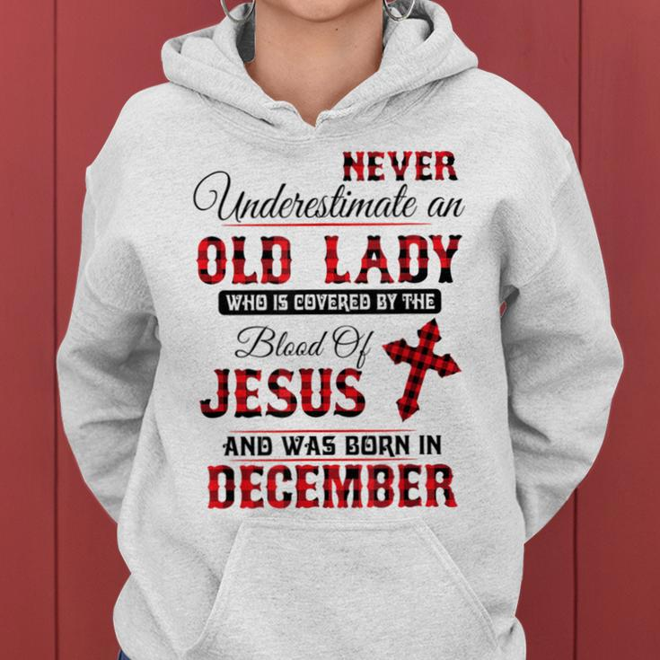 Never Underestimate An Old Lady Was Born In December Women Hoodie