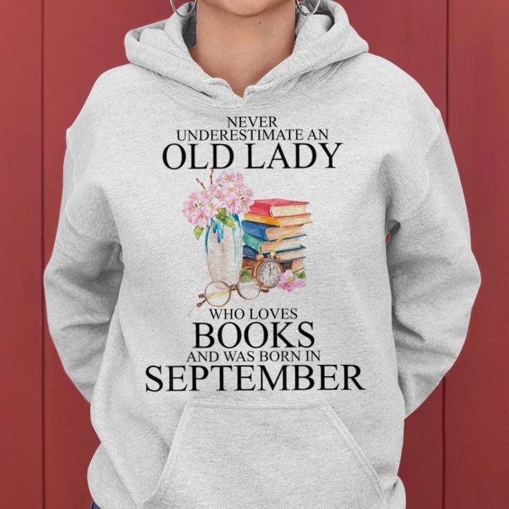 Never Underestimate An Old Lady Who Loves Books September Women Hoodie