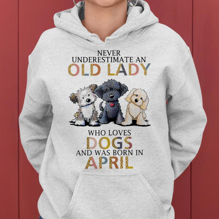 Never Underestimate Old Lady Loves Dogs Born In April Women Hoodie