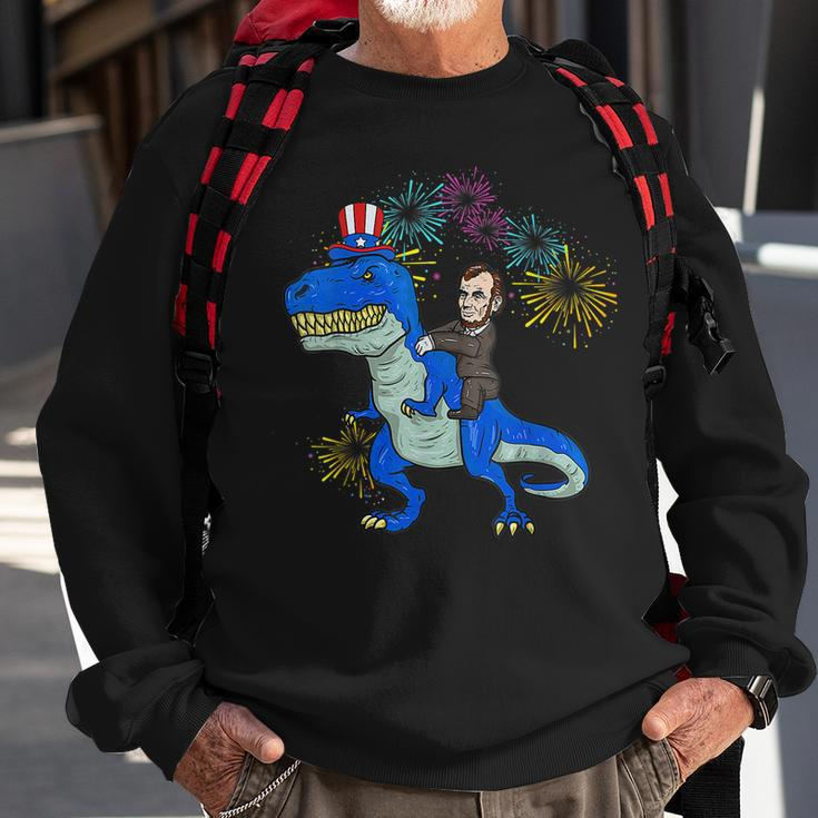 Abe Lincoln Riding A DinosaurRex 4Th Of July Boys Sweatshirt Gifts for Old Men
