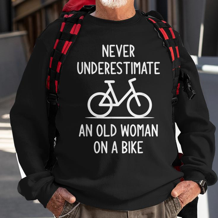 Bicycle Never Underestimate An Old Woman On A Bike Funny Old Woman Funny Gifts Sweatshirt Gifts for Old Men