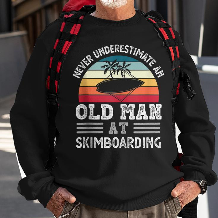 Never Underestimate An Old Man At Skimboarding Fathers Day Gift For Mens Sweatshirt Gifts for Old Men