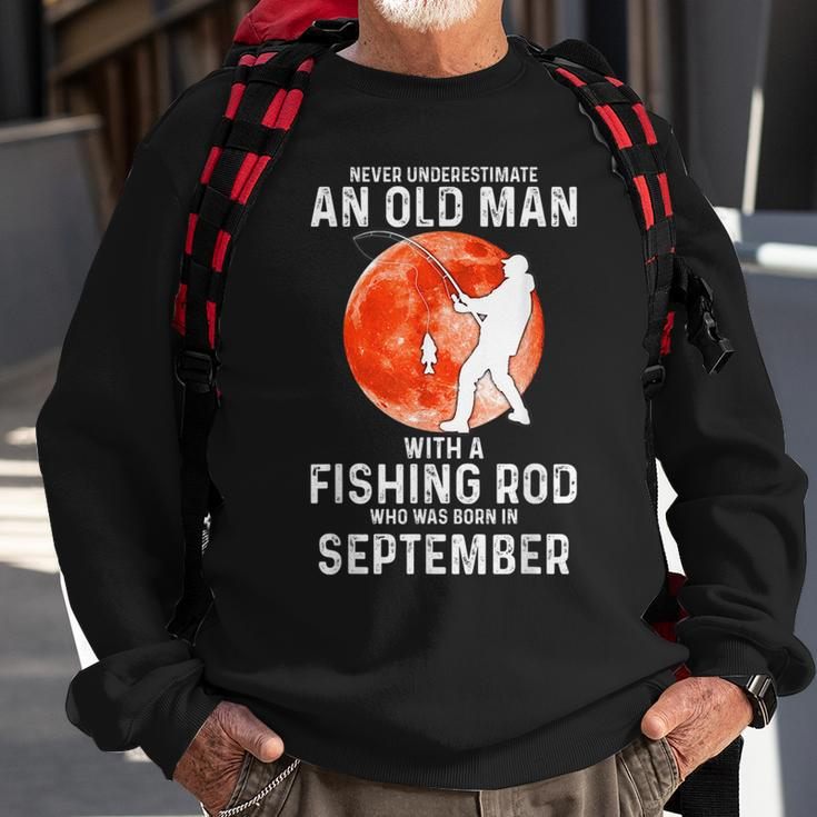 Never Underestimate An Old Man With A Fishing Rod September Sweatshirt Gifts for Old Men