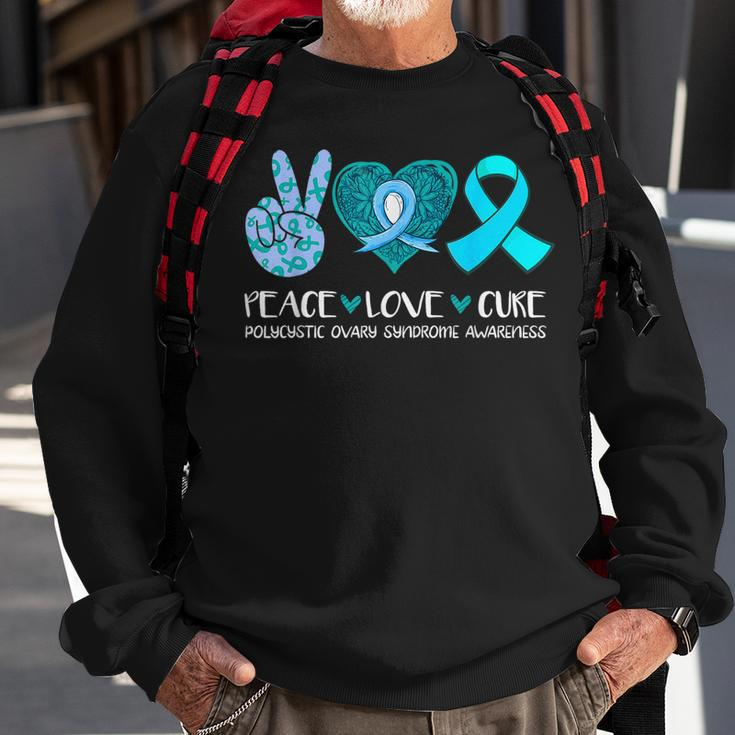 Peace Love Cure Polycystic Ovary Syndrome Pcos Teal Ribbon Sweatshirt Gifts for Old Men