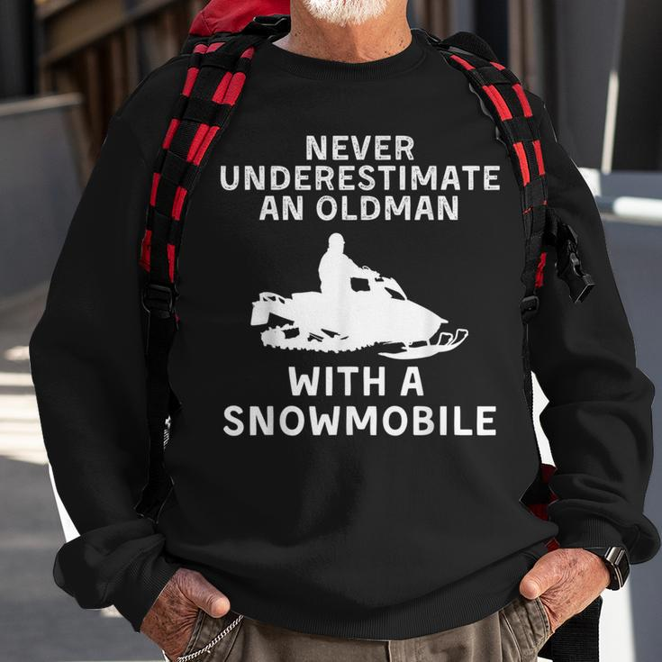 Snowmobile Never Underestimate An Old Man Winter Sports Sweatshirt Gifts for Old Men