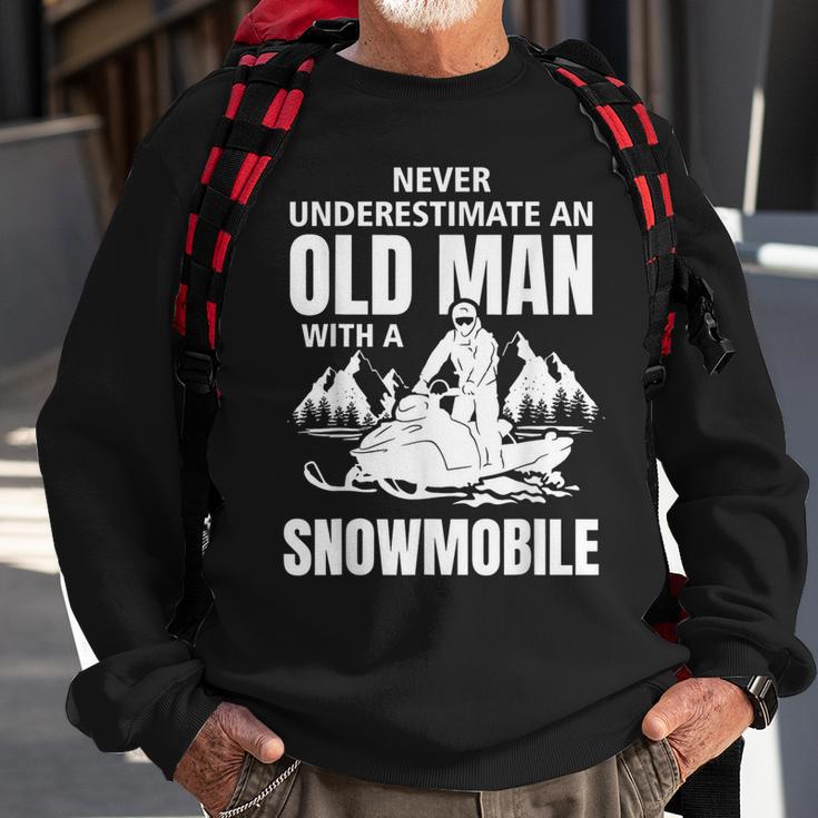 Snowmobile Never Underestimate With An Oldman Winter Sports Sweatshirt Gifts for Old Men