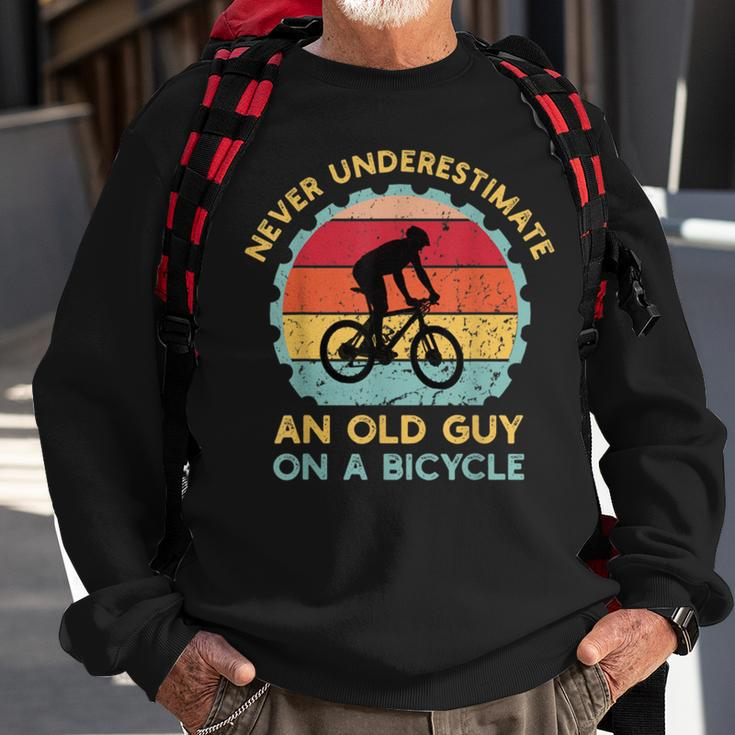 Never Underestimate An Old Guy On A Bicycle Vintage Sweatshirt Gifts for Old Men