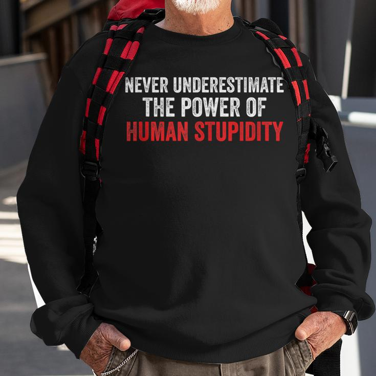 Never Underestimate The Power Of Human Stupidity Sweatshirt Gifts for Old Men