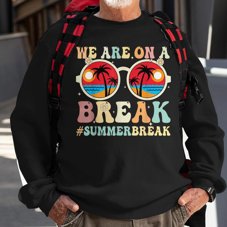 We Are On A Break Teacher Retro Groovy Summer Break Teachers Sweatshirt Gifts for Old Men