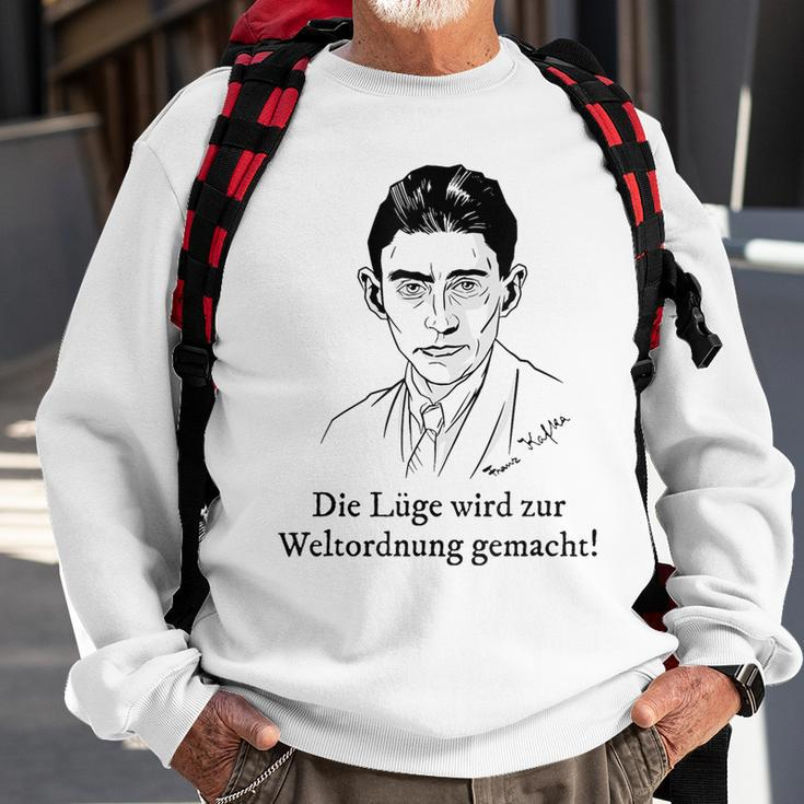 Lie Is Made To The World Order Kafka Quote Fake News Sweatshirt Gifts for Old Men