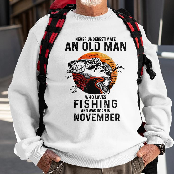 Never Underestimate An Old Man Fishing Was Born In November Sweatshirt Gifts for Old Men
