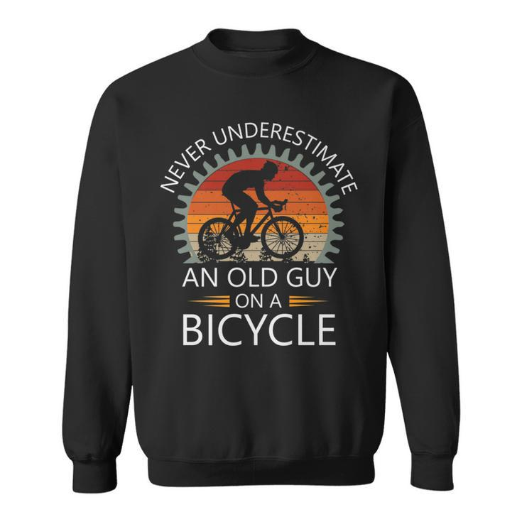 An Old Guy On A Bicycle Cycling Vintage Never Underestimate Cycling Funny Gifts Sweatshirt