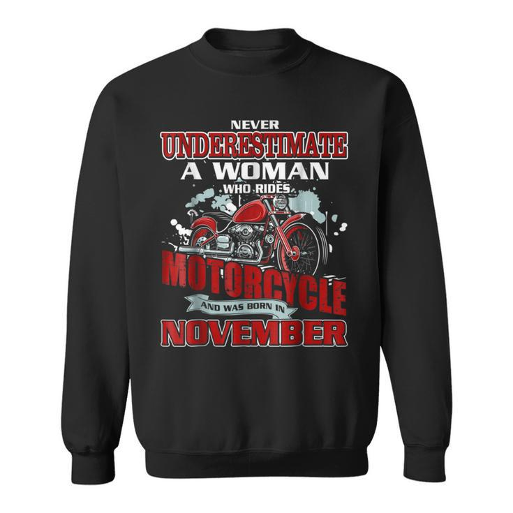 Never Underestimate A Woman Who Rides Motorcycle In November Sweatshirt