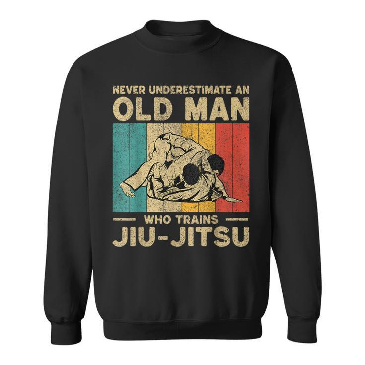 Never Underestimate An Old Man Bjj Brazilian Jiu Jitsu Old Man Funny Gifts Sweatshirt