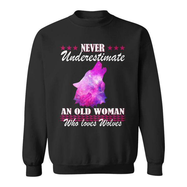 Never Underestimate An Old Woman Who Loves Wolves Gift Wolf Old Woman Funny Gifts Sweatshirt