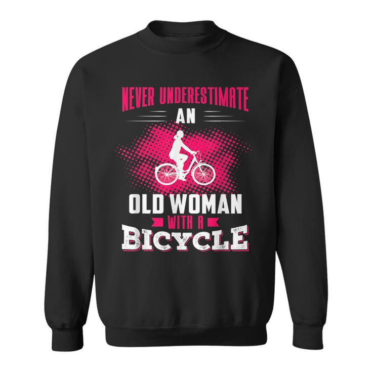 Never Underestimate An Old Woman With A Bicycle Pink Old Woman Funny Gifts Sweatshirt