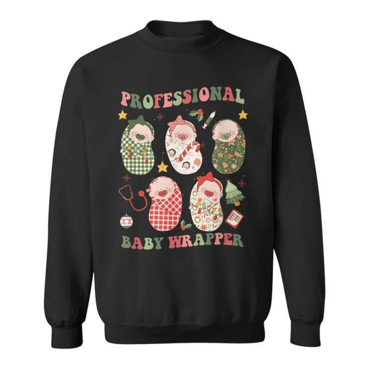 Professional Baby Wrapper Labor And Delivery Christmas Nurse Sweatshirt