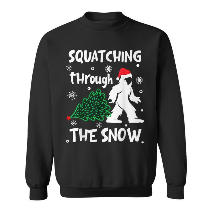Squatching Through The Snow Christmas Sasquatch Santa Hat Sweatshirt