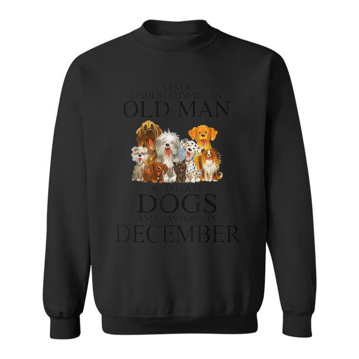 Never Underestimate An Old Man Who Loves Dogs In December Sweatshirt