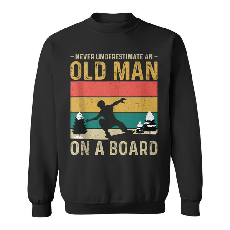 Never Underestimate An Old Man On A Snowboard Vintage Sweatshirt