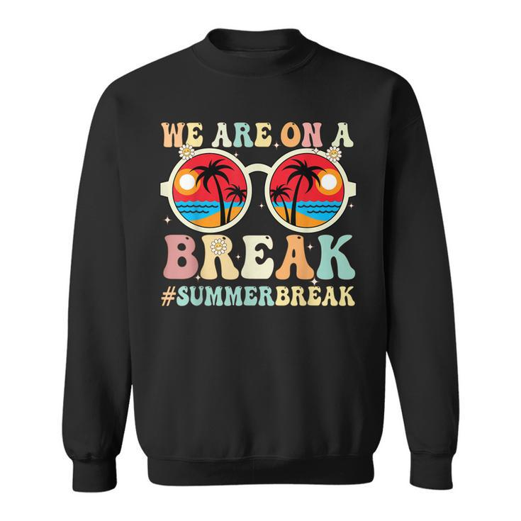We Are On A Break Teacher Retro Groovy Summer Break Teachers Sweatshirt