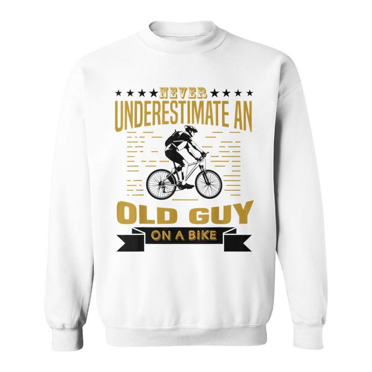 Never Underestimate An Old Guy On A Bicycle Cycling Lover Cycling Funny Gifts Sweatshirt