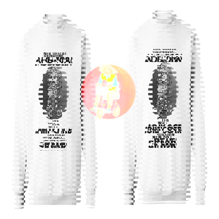 Never Underestimate An Old Woman Mobility Scooter September Old Woman Funny Gifts Sweatshirt