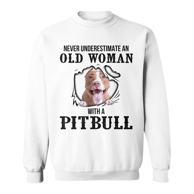 Never Underestimate An Old Woman With A Pitbull Old Woman Funny Gifts Sweatshirt