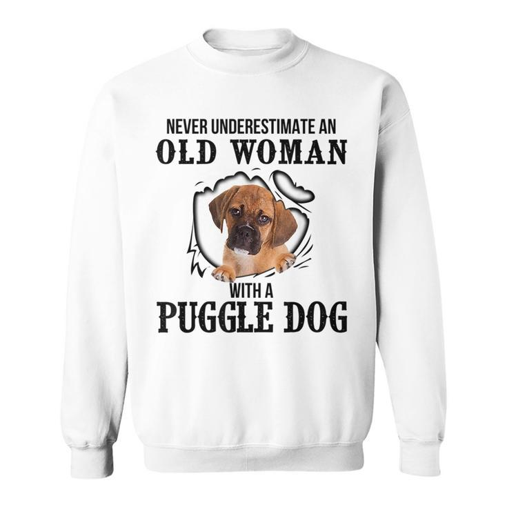Never Underestimate An Old Woman With A Puggle Dog Old Woman Funny Gifts Sweatshirt