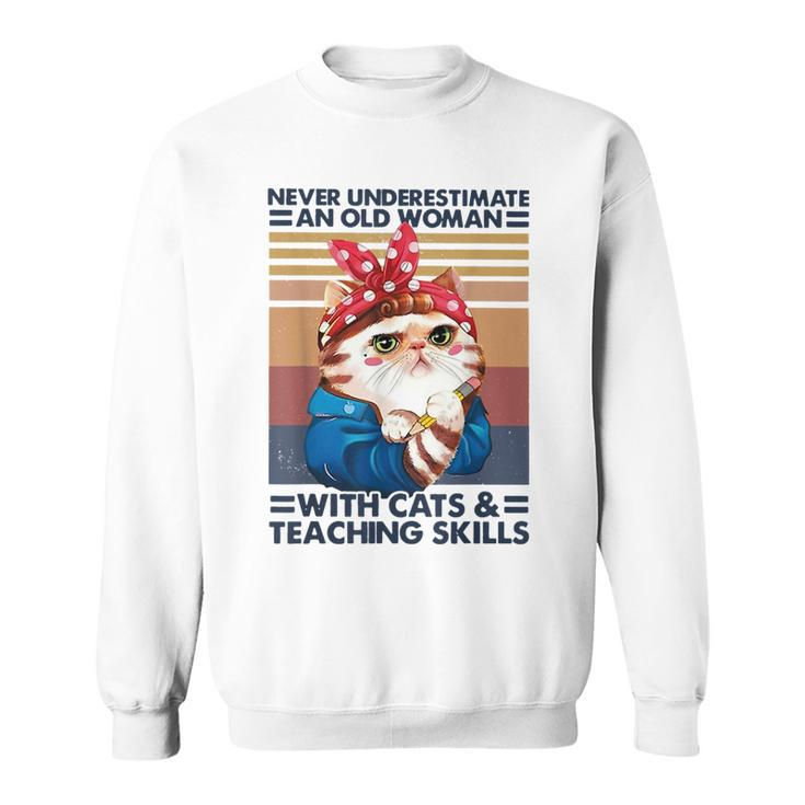Never Underestimate An Old Woman With Cats And Teaching Old Woman Funny Gifts Sweatshirt