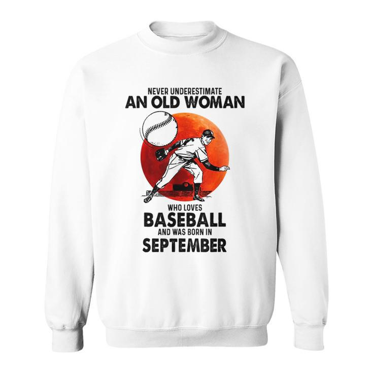 Never Underestimate Old Woman Love Baseball September Old Woman Funny Gifts Sweatshirt