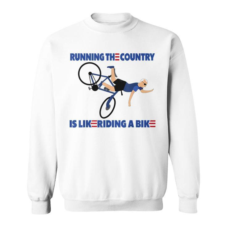 Running The Coutry Is Like Riding A Bike Joe Biden Funny Running Funny Gifts Sweatshirt