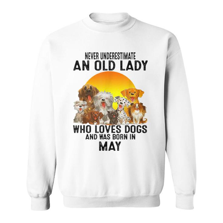 Never Underestimate An Old May Lady Who Loves Dogs Sweatshirt