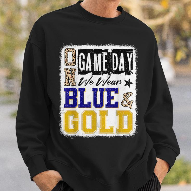 On Gameday Football We Wear Blue And Gold School Spirit Sweatshirt Gifts for Him