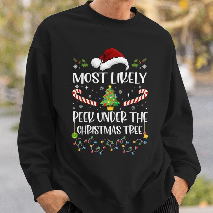 Most Likely To Peek Under The Christmas Tree Christmas Sweatshirt Gifts for Him