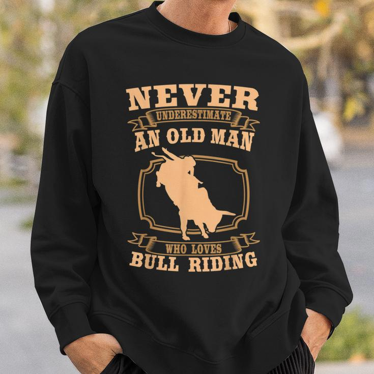 Never Underestimate An Old Man Bull Riding Rodeo Sport Old Man Funny Gifts Sweatshirt Gifts for Him