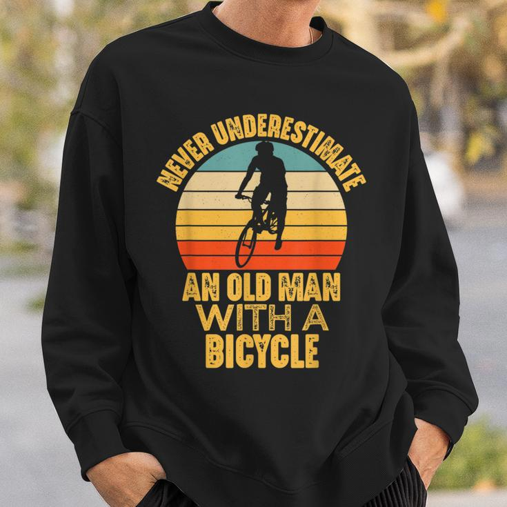 Never Underestimate An Old Man With A Bicycle Funny Cycling Sweatshirt Gifts for Him