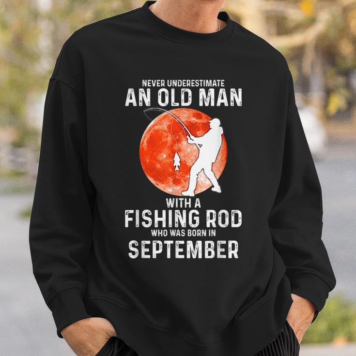 Never Underestimate An Old Man With A Fishing Rod September Sweatshirt Gifts for Him
