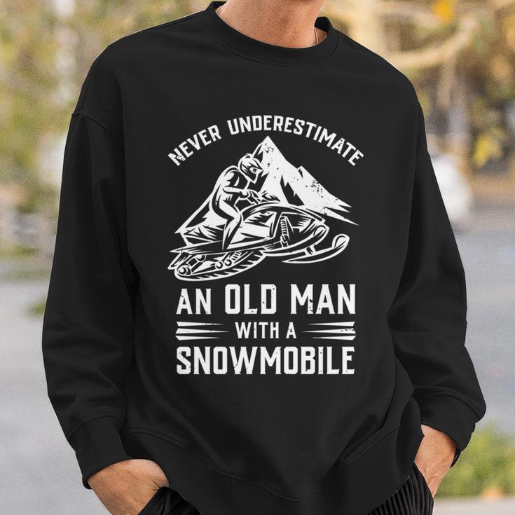 Never Underestimate An Old Man With A Snowmobile Funny Gift Sweatshirt Gifts for Him